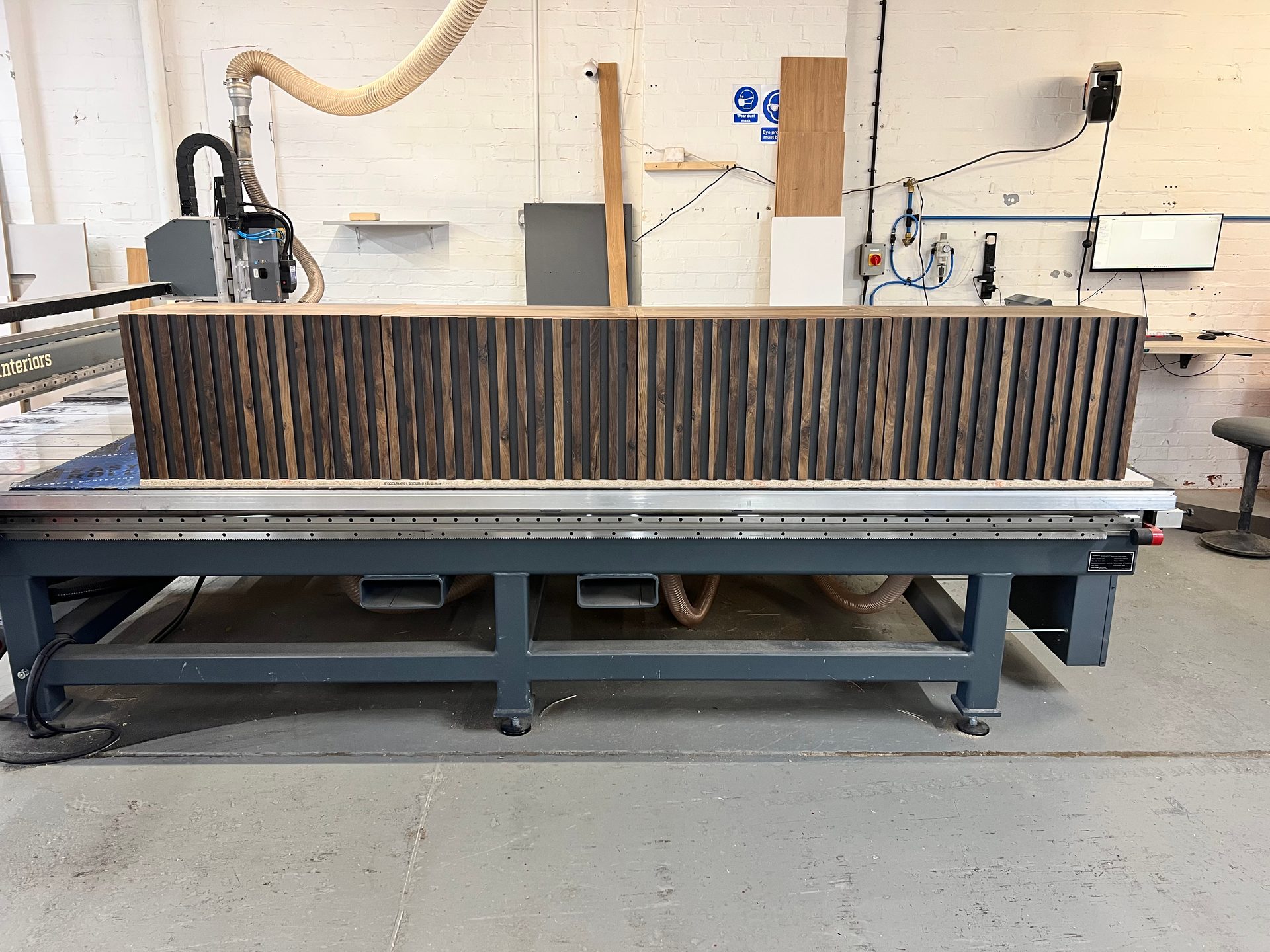 Slatted base unit on the CNC bed in the DTJ Interiors workshop