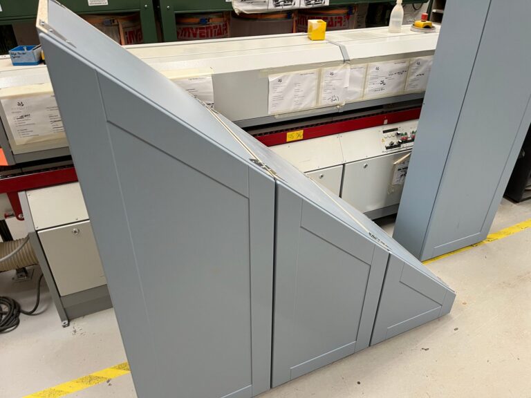 Under-stairs units with shaker fronts in the workshop
