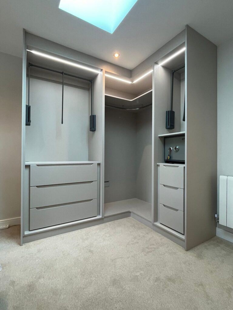 Corner walk-in wardrobe with a safe box